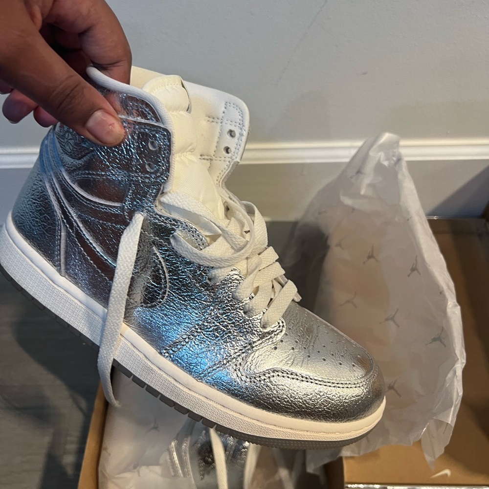 Nike Women’s High-Top Sneakers in Metallic Silver and White